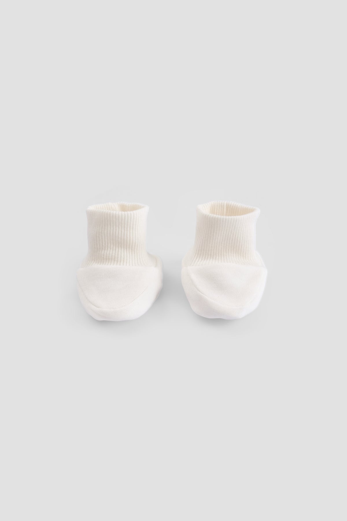 white newborn booties ribbed ankle soft baby footwear