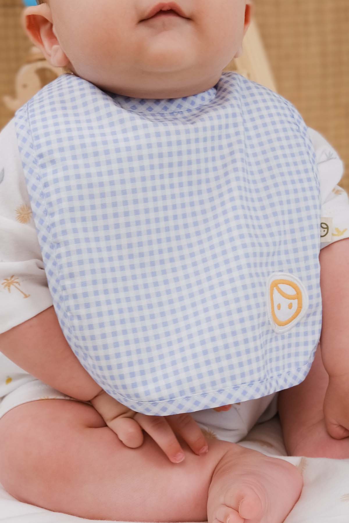 baby wearing organic cotton waterproof baby bib blue feeding time