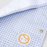 organic cotton baby bib detail logo embroidery blue picnic fabric