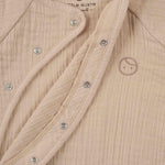 beige baby romper unisex outfit
