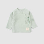 baby muslin clothing lightweight fabric close up
