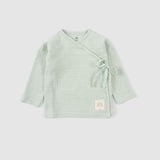 baby muslin clothing lightweight fabric close up
