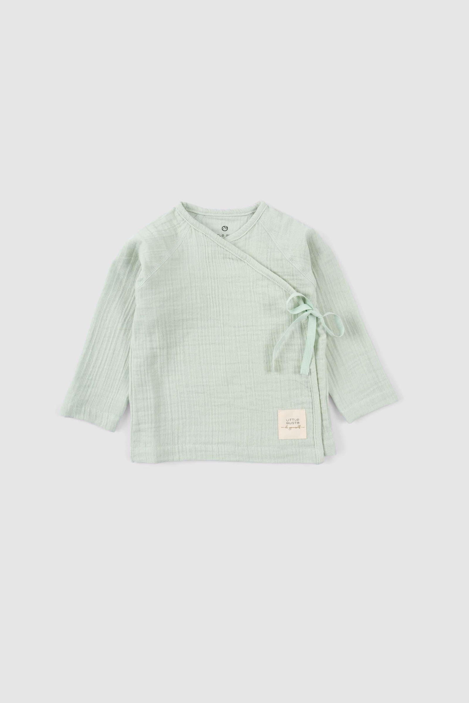 baby muslin clothing lightweight fabric close up
