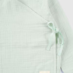 organic baby outfit breathable muslin texture
