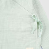 organic baby outfit breathable muslin texture
