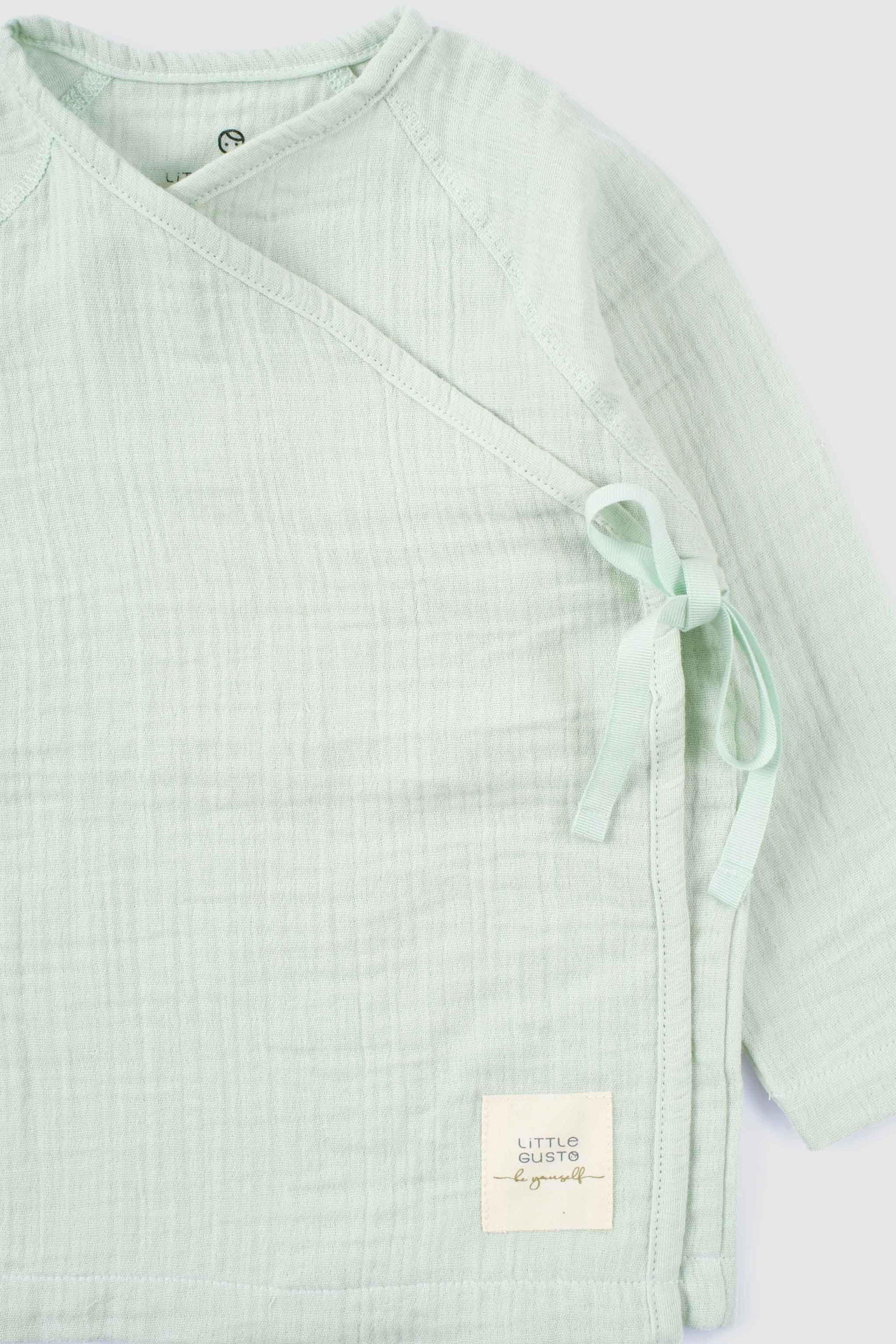 organic baby outfit breathable muslin texture
