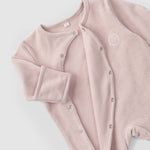 pink baby grow footed romper
