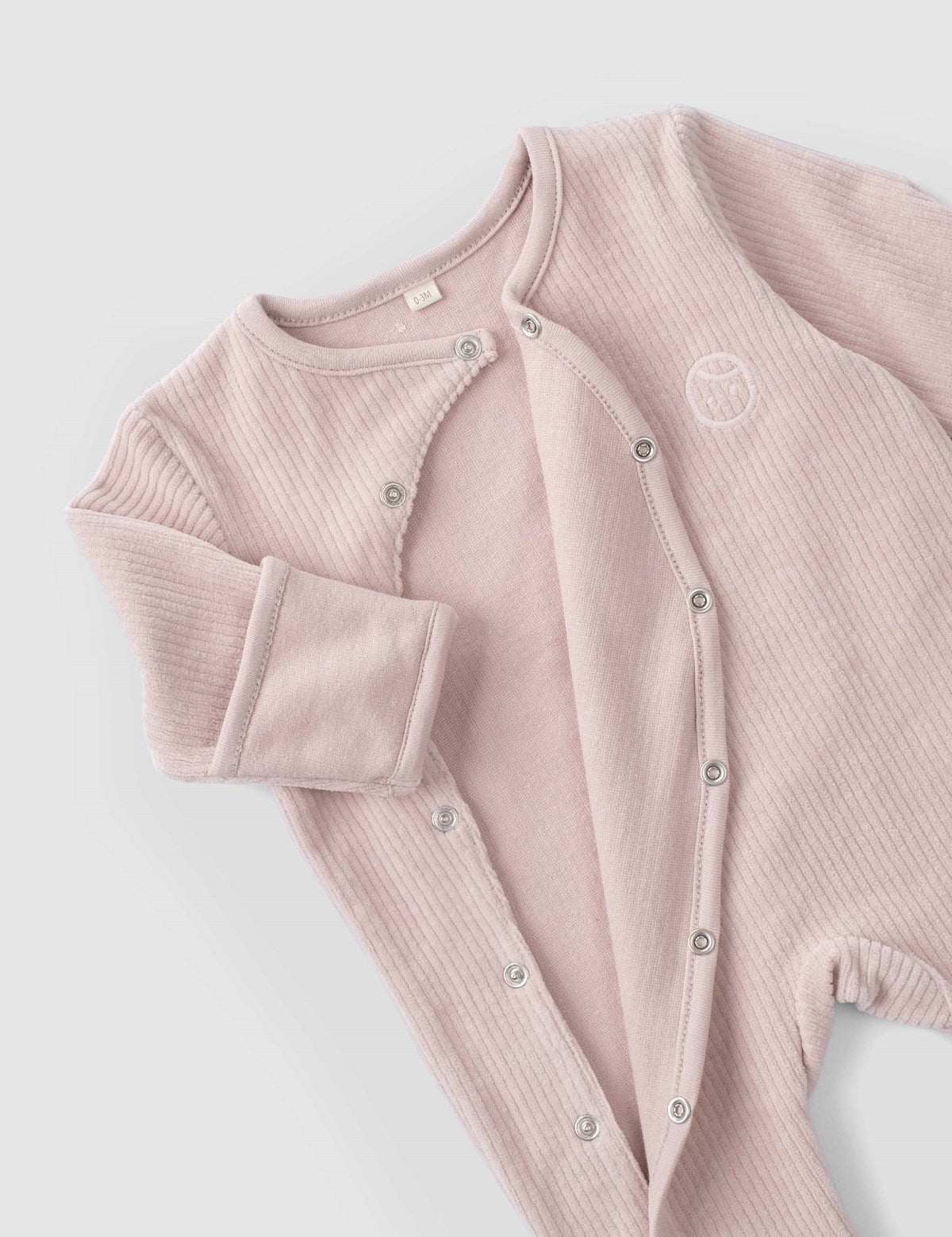 pink baby grow footed romper
