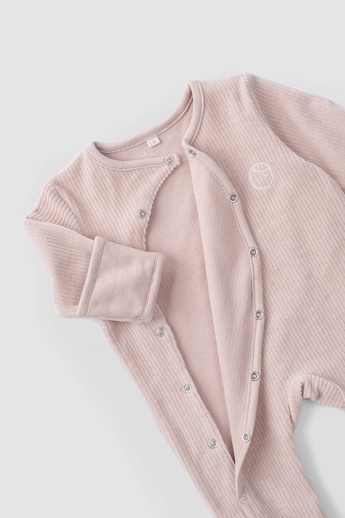 pink baby grow footed romper
