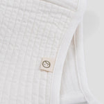 white ribbed baby bonnet organic cotton textured hat detail