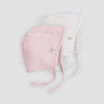 pink and white ribbed baby bonnet organic cotton textured hat detail