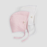 pink and white ribbed baby bonnet organic cotton textured hat detail