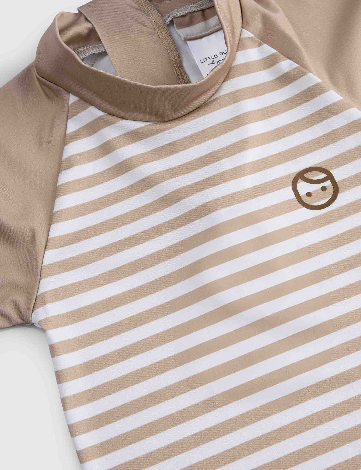 brown striped baby swimwear fabric detail